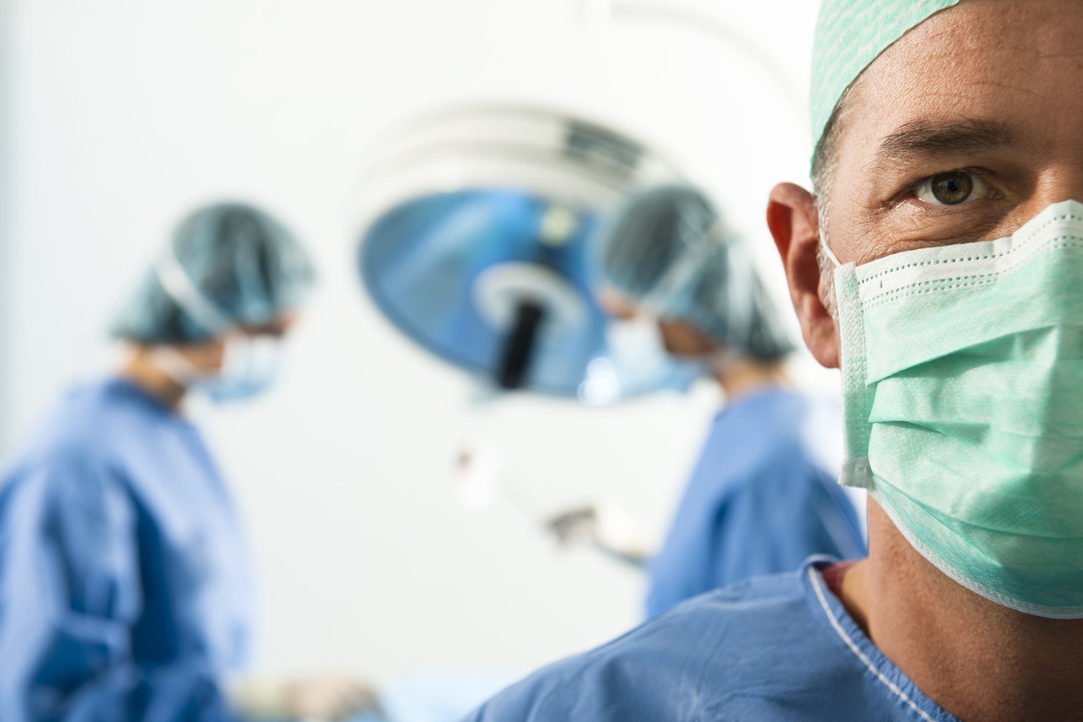 Portrait Of A Male Surgeon At Work